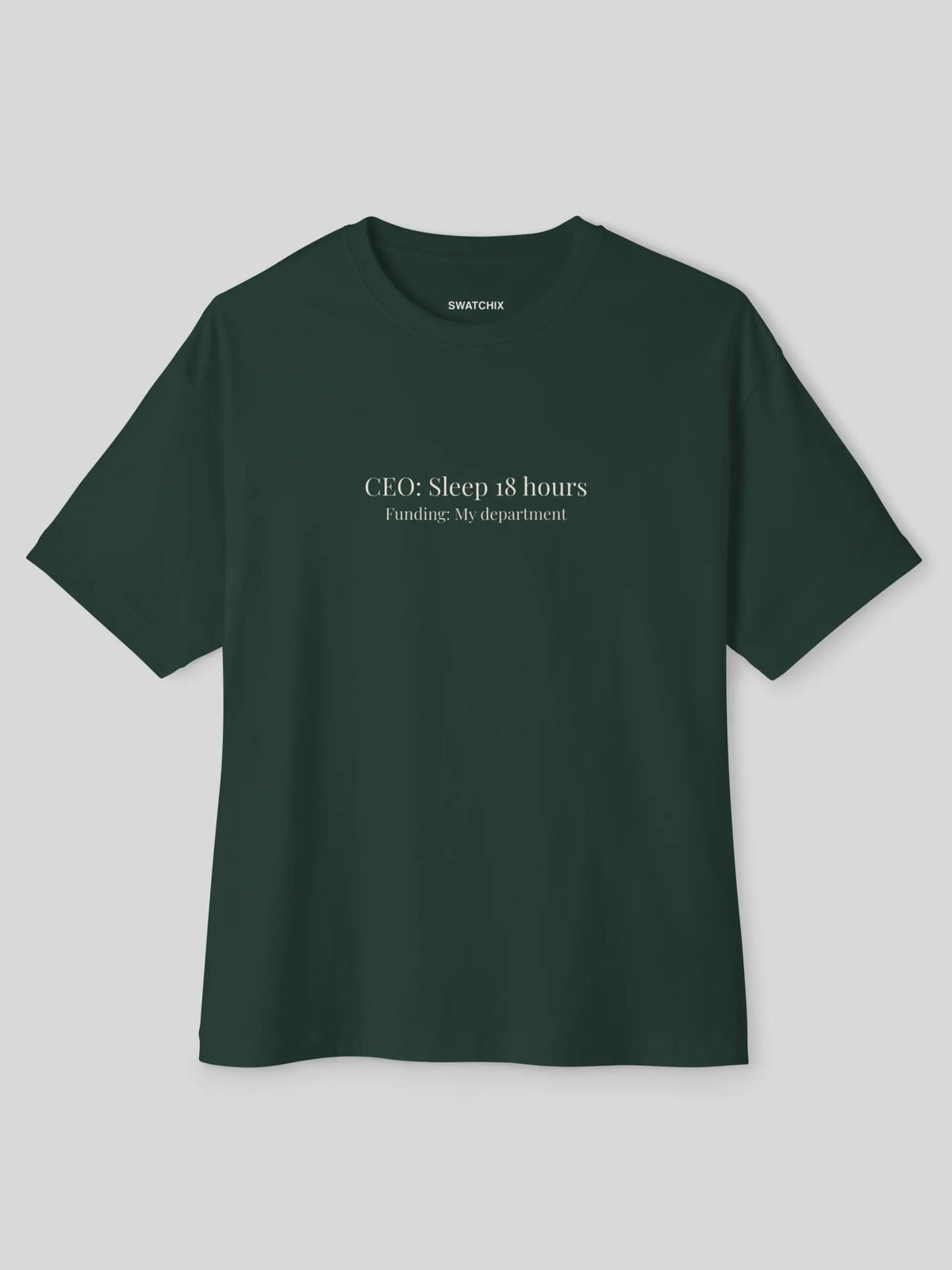 A dark forest green short-sleeve t-shirt with white printed text on the chest reading 'CEO: Sleep 18 hours Funding: My department!' and a small 'SHAPCHU' brand label inside the collar, shown on a neutral gray background.