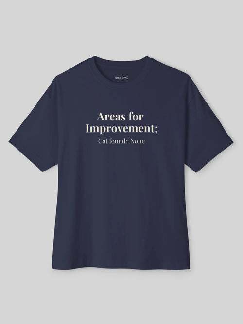 Areas for Improvement Oversized Tee in Navy, printed with "Areas for Improvement: Cat found: None."