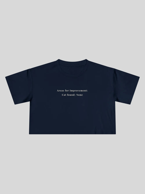 Areas for Improvement Cropped Tee in Navy, printed with "Areas for Improvement: Cat found: None."